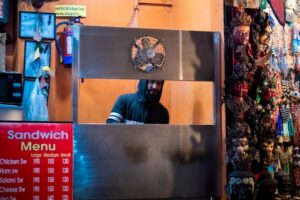 man in blue long sleeve shirt