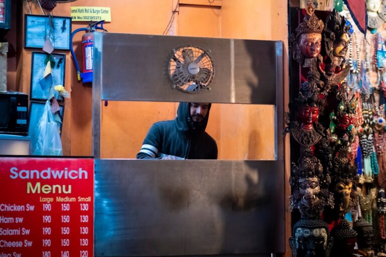 man in blue long sleeve shirt