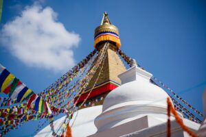 white yellow and blue concrete building under blue sky during daytime