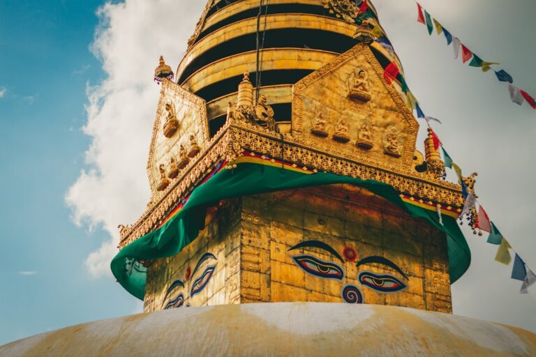 Local Experiences Kids Will Love in Kathmandu β Travel Guide to Kathmandu 34 gold and blue concrete building under blue sky during daytime