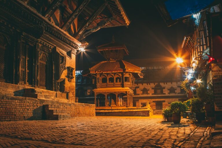 Top 10 Dishes to Try in Kathmandu – Travel Guide to Kathmandu 131 a building with a clock tower on top of it