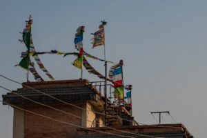 a group of flags on a roof