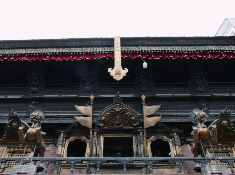 a building with statues in front of it