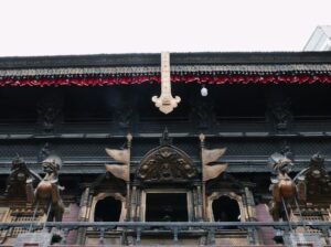 a building with statues in front of it