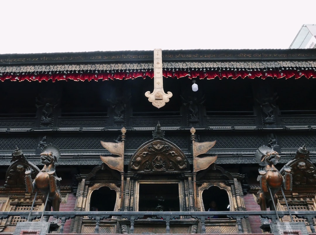 a building with statues in front of it