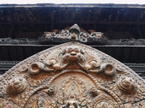 a statue of a person with a crown and a crown