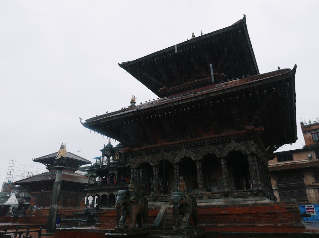 a building with statues in front of it