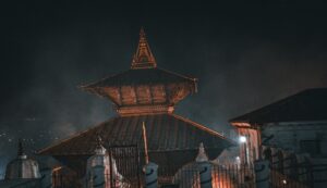 a tall building with a clock on the top of it