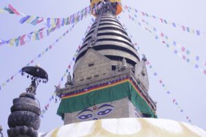 a very tall building with a very colorful decoration on top of it