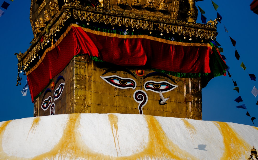 a tall tower with a sky in the background