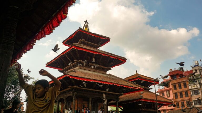 Where to Eat Like a Local in Kathmandu – Travel Guide to Kathmandu 83 A person standing in front of a building