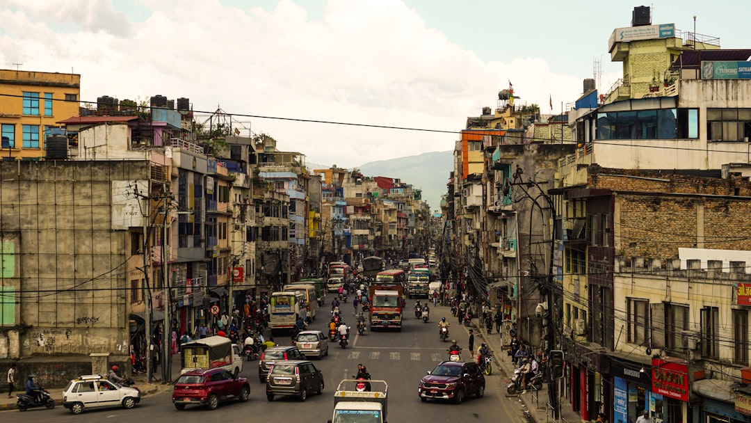 A city street filled with lots of traffic
