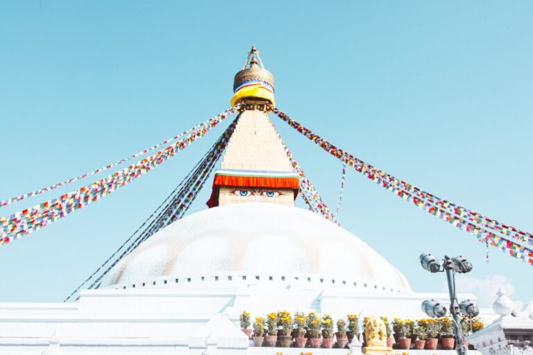 A large white building with a sky background