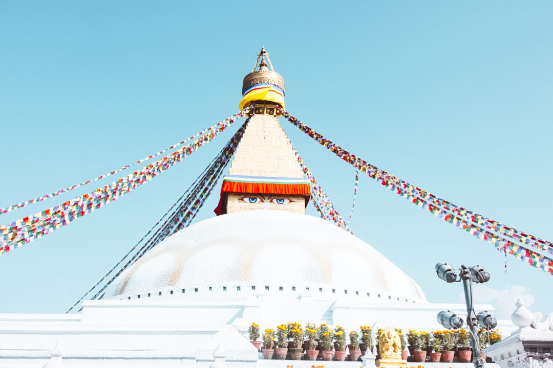 A large white building with a sky background